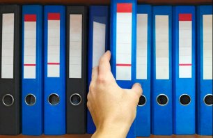hand-on-ring-binder-compressed.jpg